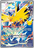Zapdos 133/128 en inglés con sello del 30 aniversario